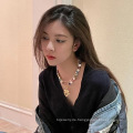 Shangjie Oem Joyas Mode Schmuck Halsketten für Frauen einzigartige Böhmen Bunte Perlen Halskette Blume Perle Charms Heart Halskette